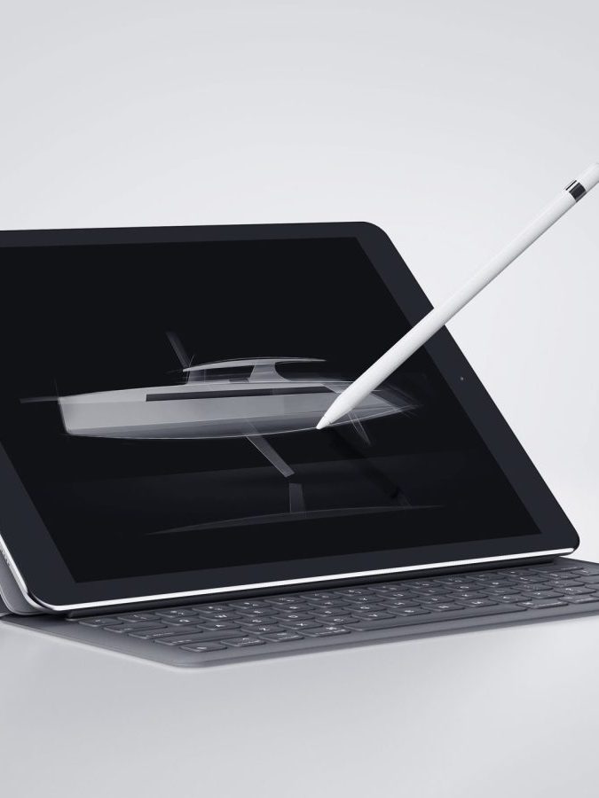 A tablet with a keyboard cover and stylus displays a digital sketch of a boat on its screen.
